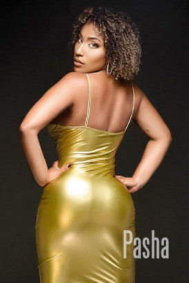 Hot Brazilian girl in a tight gold dress
