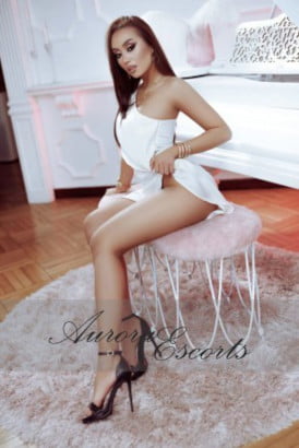 Petite skinny Romanian girl in a white dress pulled up showing off her sexy legs